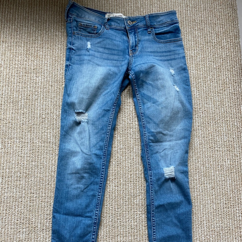 Mid rise distressed skinny denim